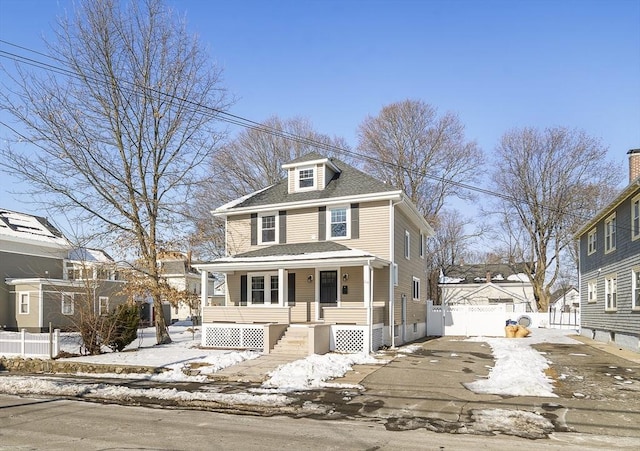 view of property featuring a porch