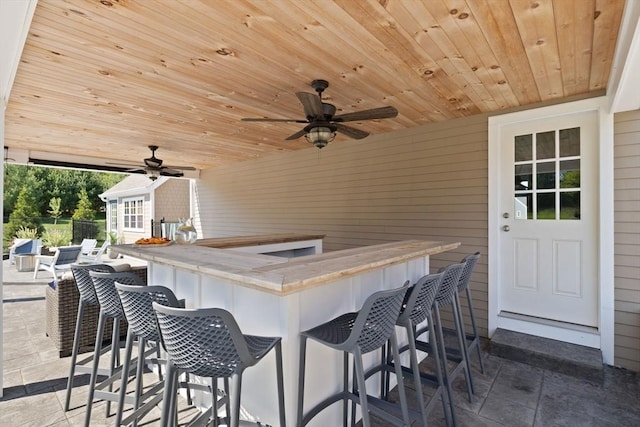 view of patio / terrace featuring fence