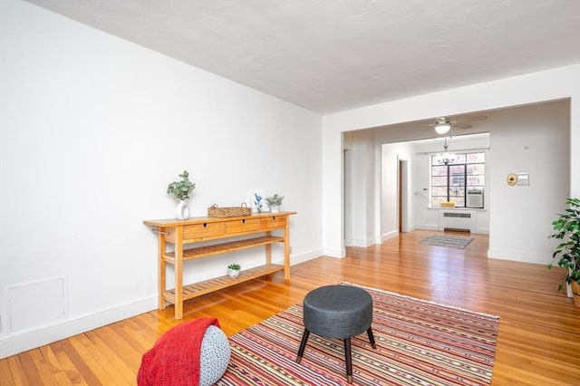 sitting room featuring hardwood / wood-style flooring