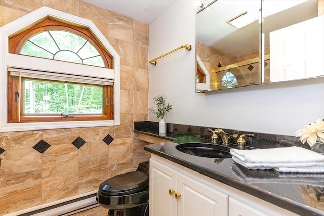 full bath with baseboard heating, a healthy amount of sunlight, vanity, and a shower