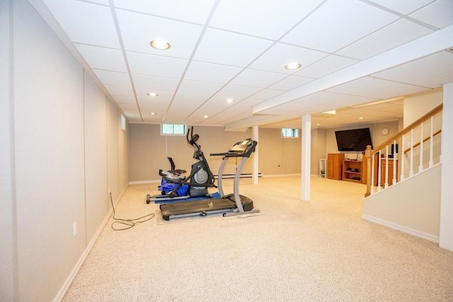 workout room with baseboards, recessed lighting, and carpet flooring