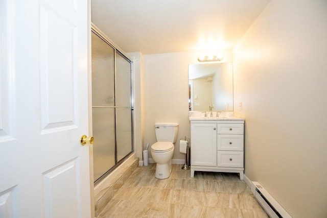 bathroom with vanity, a baseboard heating unit, baseboards, toilet, and a shower stall