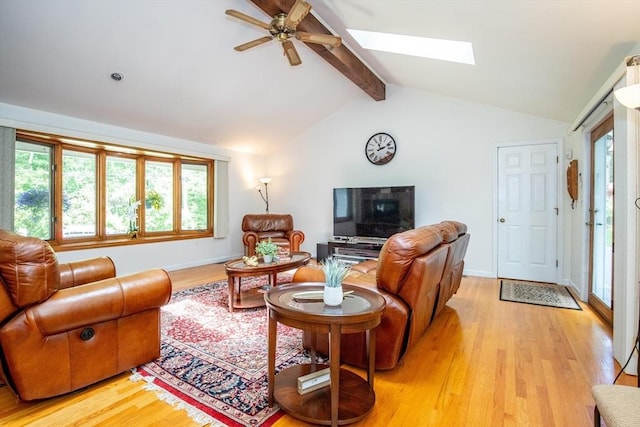 living area with light wood finished floors and a healthy amount of sunlight