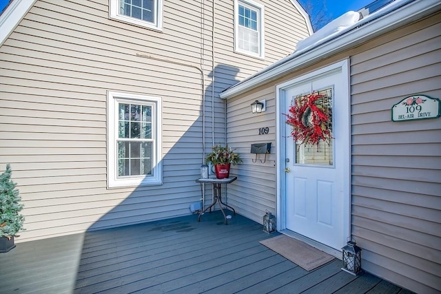 doorway to property with a deck