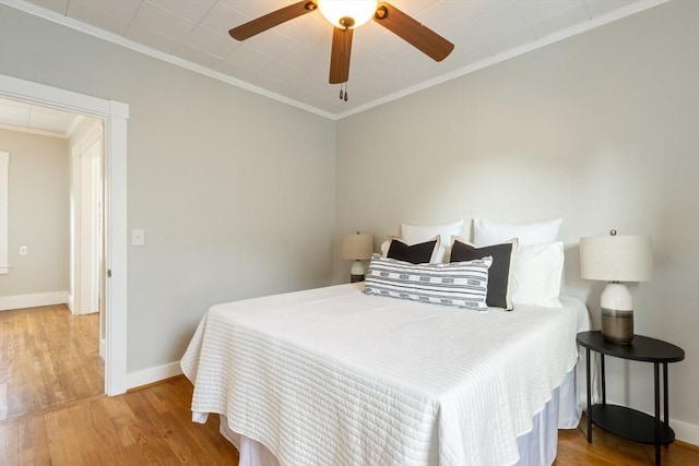 282 Palmer St, New Bedford, MA 02740 - bedroom featuring ornamental molding, wood finished floors, baseboards, and a ceiling fan