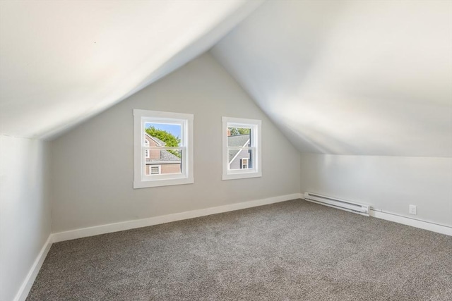 282 Palmer St, New Bedford, MA 02740 - additional living space with baseboard heating, carpet, vaulted ceiling, and baseboards