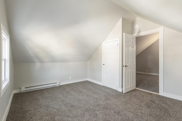 282 Palmer St, New Bedford, MA 02740 - additional living space featuring a baseboard radiator, lofted ceiling, carpet flooring, healthy amount of natural light, and baseboards