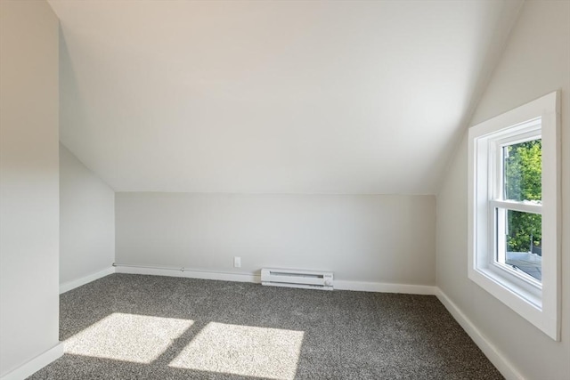 282 Palmer St, New Bedford, MA 02740 - additional living space with baseboard heating, lofted ceiling, carpet, and baseboards