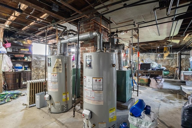 282 Palmer St, New Bedford, MA 02740 - utility room featuring gas water heater and radiator heating unit