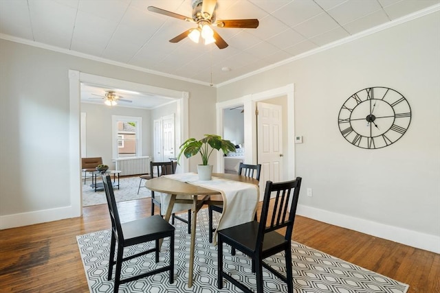 282 Palmer St, New Bedford, MA 02740 - dining room featuring a ceiling fan, baseboards, wood finished floors, and crown molding
