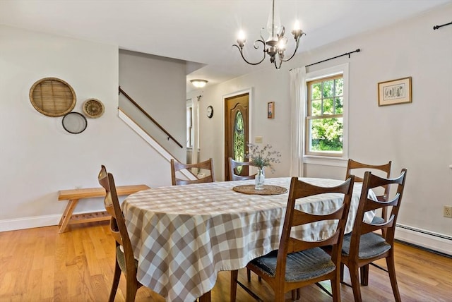 31 Blanding Rd, Rehoboth, MA 02769 - dining space with a chandelier, light wood finished floors, stairway, a baseboard radiator, and baseboards