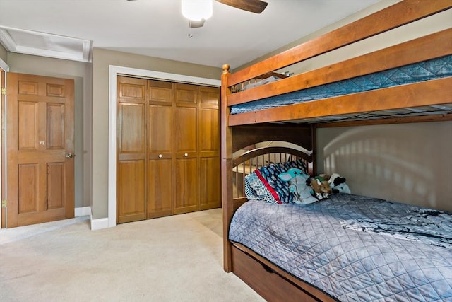 31 Blanding Rd, Rehoboth, MA 02769 - bedroom with light colored carpet, a closet, ceiling fan, attic access, and baseboards