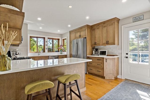 31 Blanding Rd, Rehoboth, MA 02769 - kitchen with stainless steel appliances, recessed lighting, decorative backsplash, a peninsula, and plenty of natural light