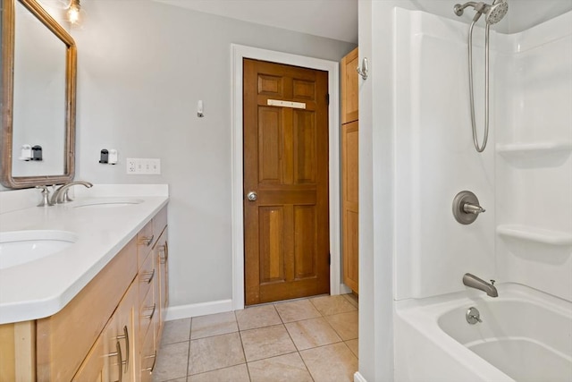 31 Blanding Rd, Rehoboth, MA 02769 - full bathroom with baseboards, washtub / shower combination, double vanity, and tile patterned floors