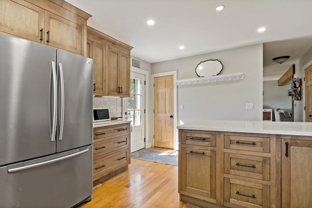 31 Blanding Rd, Rehoboth, MA 02769 - kitchen featuring freestanding refrigerator, recessed lighting, light wood finished floors, light countertops, and backsplash