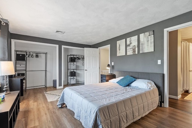 193 Patrick Rd Unit 193, Tewksbury, MA 01876 - bedroom with wood finished floors and stainless steel refrigerator