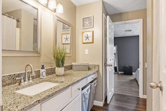 193 Patrick Rd Unit 193, Tewksbury, MA 01876 - full bath featuring wood finished floors, vanity, connected bathroom, and a heating unit