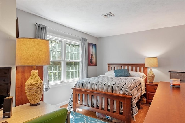 193 Patrick Rd Unit 193, Tewksbury, MA 01876 - bedroom featuring wood finished floors and baseboards