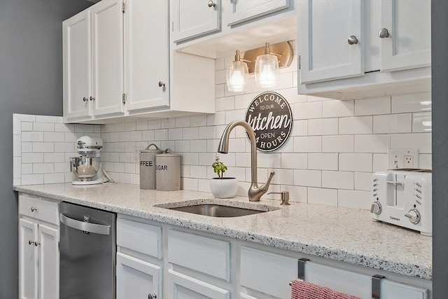 193 Patrick Rd Unit 193, Tewksbury, MA 01876 - kitchen featuring dishwasher, white cabinetry, tasteful backsplash, and light stone counters