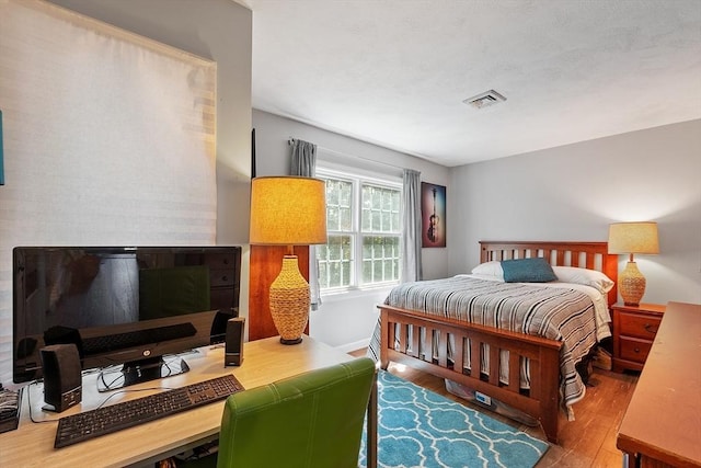 193 Patrick Rd Unit 193, Tewksbury, MA 01876 - bedroom featuring wood finished floors and a desk