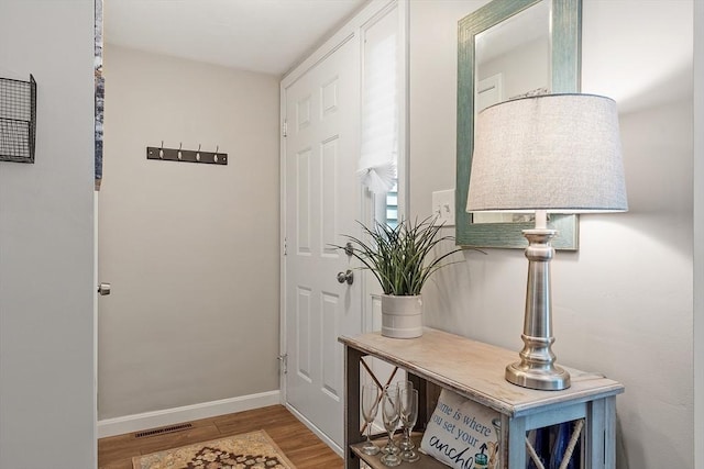 193 Patrick Rd Unit 193, Tewksbury, MA 01876 - doorway with wood finished floors and baseboards