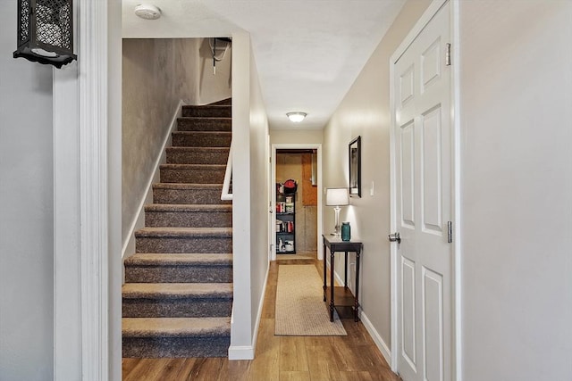 193 Patrick Rd Unit 193, Tewksbury, MA 01876 - staircase with wood finished floors and baseboards