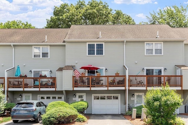 193 Patrick Rd Unit 193, Tewksbury, MA 01876 - back of property with a garage and driveway
