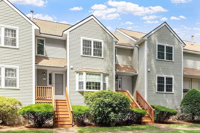 193 Patrick Rd Unit 193, Tewksbury, MA 01876 - townhome / multi-family property featuring stairs and a shingled roof
