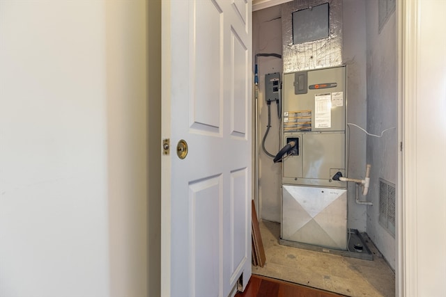 bathroom with hardwood / wood-style floors