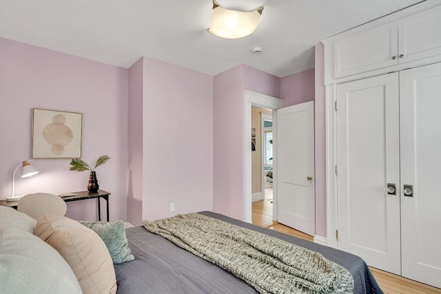 12 Highland Ave Unit 1, Arlington, MA 02476 - bedroom with a closet and light wood-style flooring