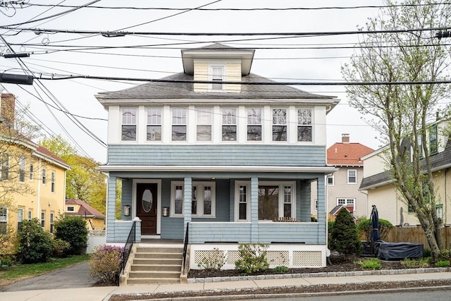 12 Highland Ave Unit 1, Arlington, MA 02476 - american foursquare style home with a porch and fence