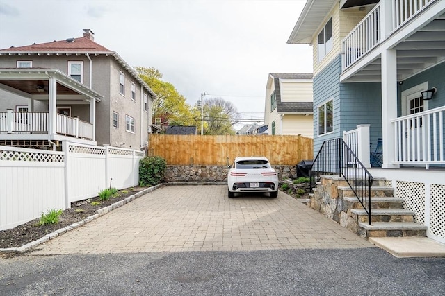 12 Highland Ave Unit 1, Arlington, MA 02476 - view of parking / parking lot with fence