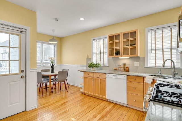 12 Highland Ave Unit 1, Arlington, MA 02476 - kitchen featuring white dishwasher, a healthy amount of sunlight, a sink, and light wood finished floors