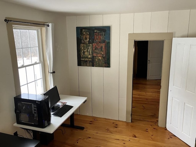 home office featuring light wood-style flooring