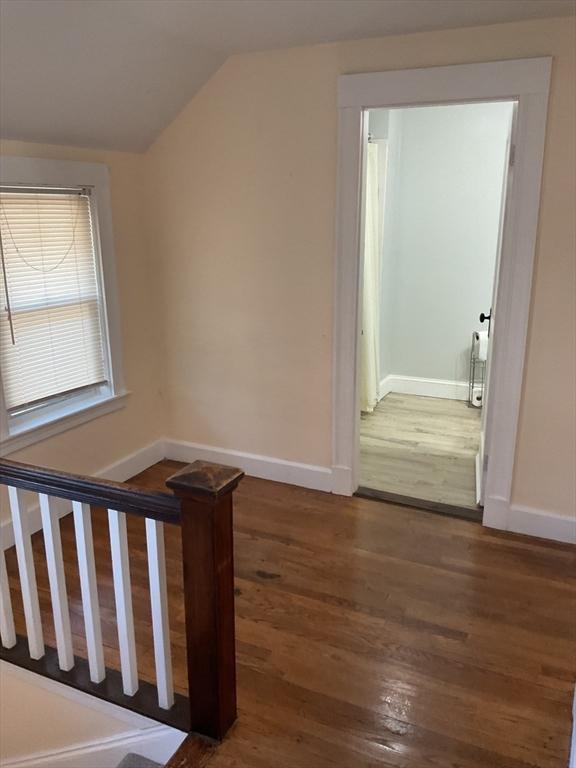 56 Riverview St, Dedham, MA 02026 - additional living space featuring wood finished floors, lofted ceiling, and baseboards