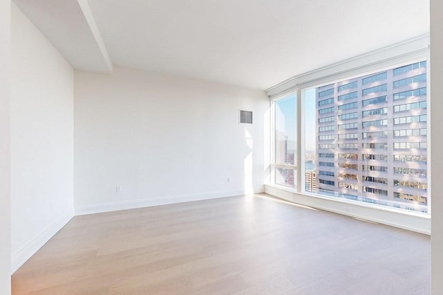 240 Devonshire St Unit 4012, Boston, MA 02110 - empty room featuring wood finished floors and baseboards