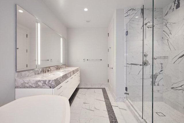 240 Devonshire St Unit 4012, Boston, MA 02110 - bathroom with marble finish flooring, recessed lighting, double vanity, a marble finish shower, and a freestanding tub