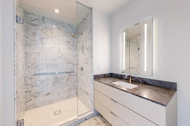 240 Devonshire St Unit 4012, Boston, MA 02110 - full bathroom with a marble finish shower, vanity, marble look tiles, and recessed lighting
