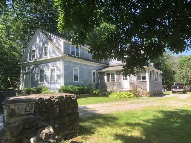 84 Booth Hill Rd, Scituate, MA 02066 - view of front of home with a front lawn