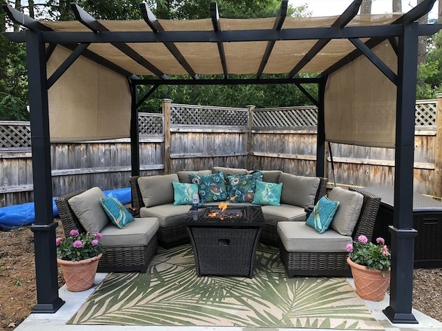 view of patio with an outdoor living space with a fire pit and a pergola