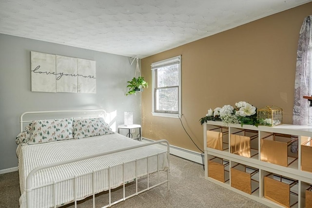 bedroom with carpet and baseboards