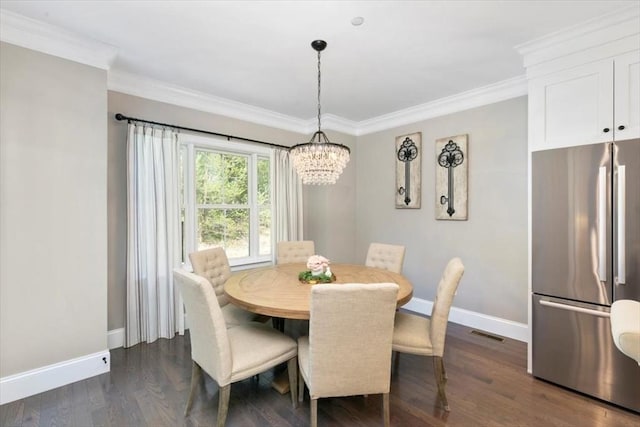 21 Bailey Pond Ln Unit 21, Amesbury, MA 01913 - dining space with baseboards, a chandelier, crown molding, and dark wood-style floors