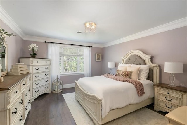 21 Bailey Pond Ln Unit 21, Amesbury, MA 01913 - bedroom with crown molding, dark wood finished floors, and baseboards