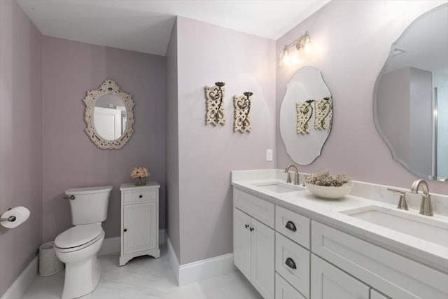 21 Bailey Pond Ln Unit 21, Amesbury, MA 01913 - full bath featuring toilet, baseboards, double vanity, and marble look tiles