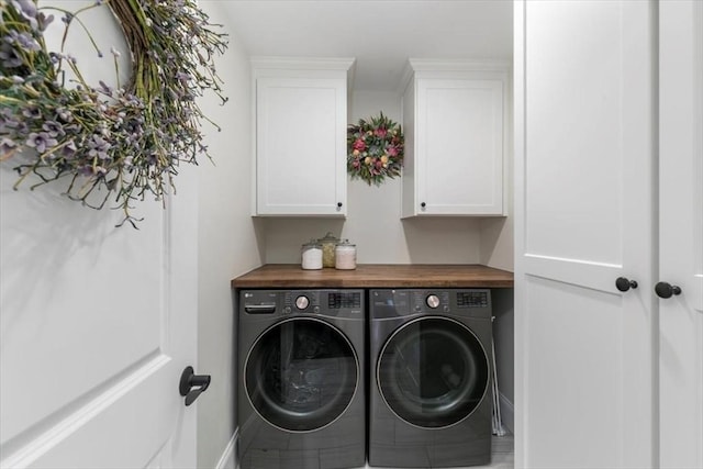 21 Bailey Pond Ln Unit 21, Amesbury, MA 01913 - washroom with washing machine and clothes dryer, cabinet space, and baseboards