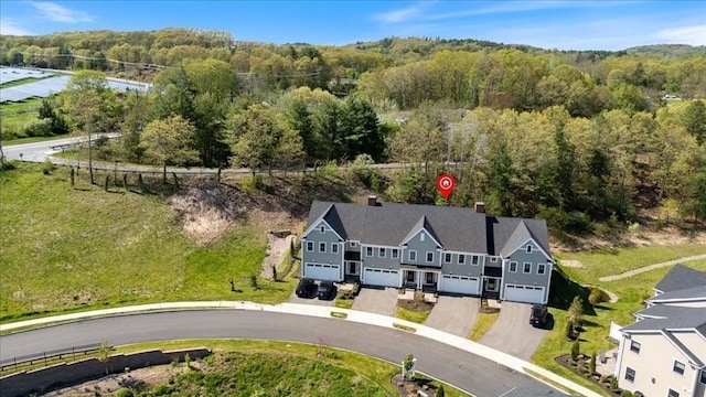 21 Bailey Pond Ln Unit 21, Amesbury, MA 01913 - aerial view of property and surrounding area with a heavily wooded area