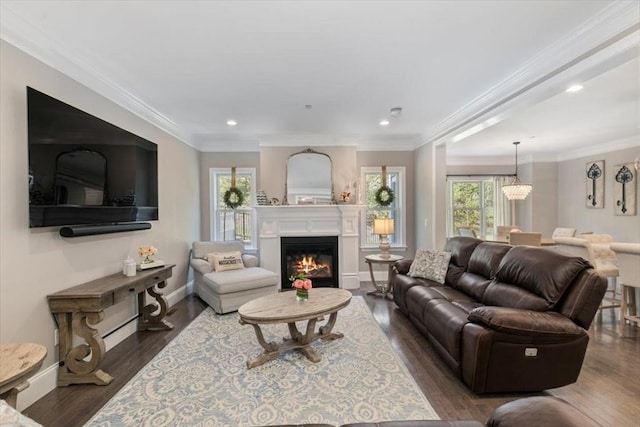 21 Bailey Pond Ln Unit 21, Amesbury, MA 01913 - living room with baseboards, a glass covered fireplace, dark wood-type flooring, a chandelier, and recessed lighting