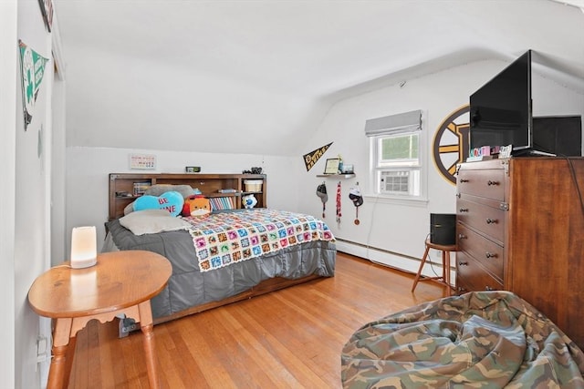 2 Woodbrier Rd, Topsfield, MA 01983 - bedroom featuring baseboard heating, lofted ceiling, and wood finished floors