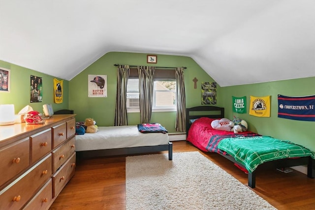 2 Woodbrier Rd, Topsfield, MA 01983 - bedroom featuring wood finished floors, a baseboard heating unit, and lofted ceiling