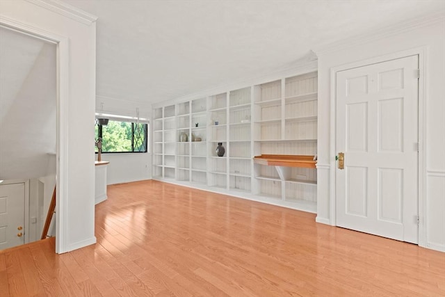 246 Farrwood Dr Unit 246, Haverhill, MA 01835 - spare room featuring wood finished floors, crown molding, and built in features